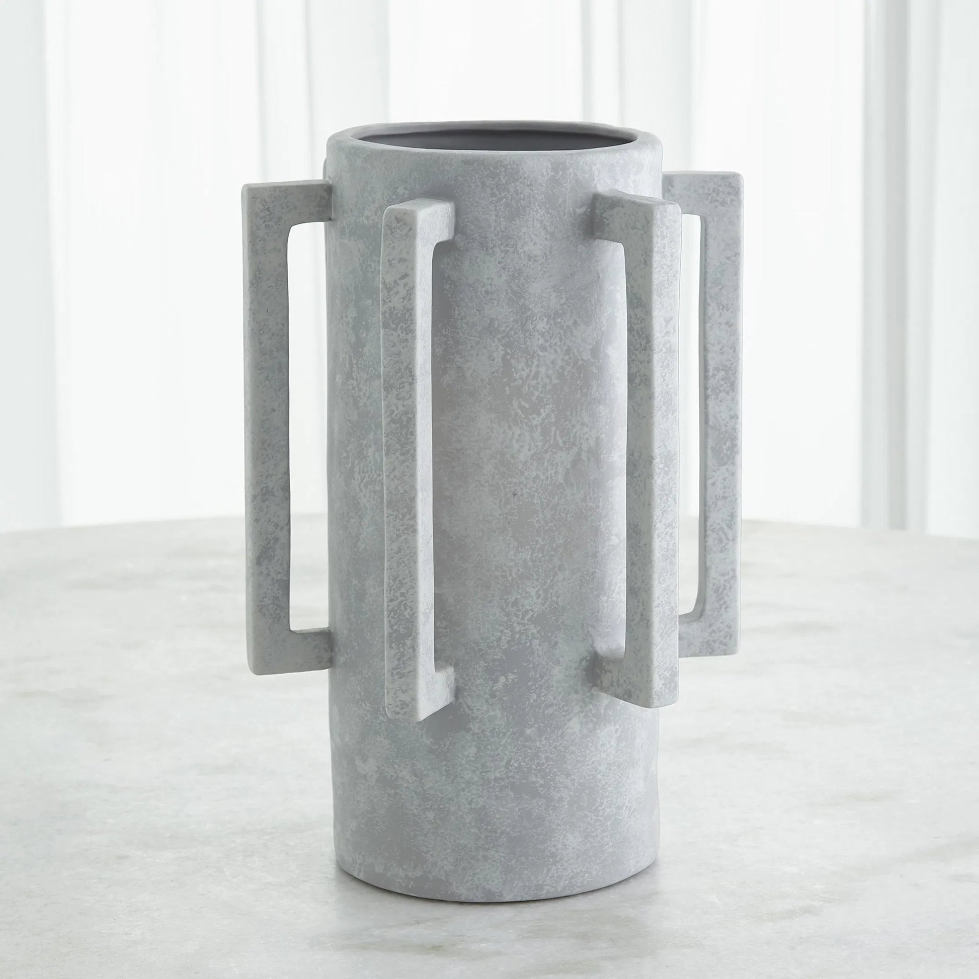 Normandie Vase by Global Views. Made from ceramic in a modern style.