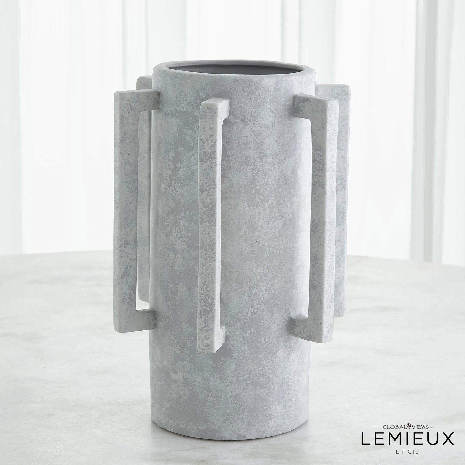 Normandie Vase by Global Views. Made from ceramic in a modern style.