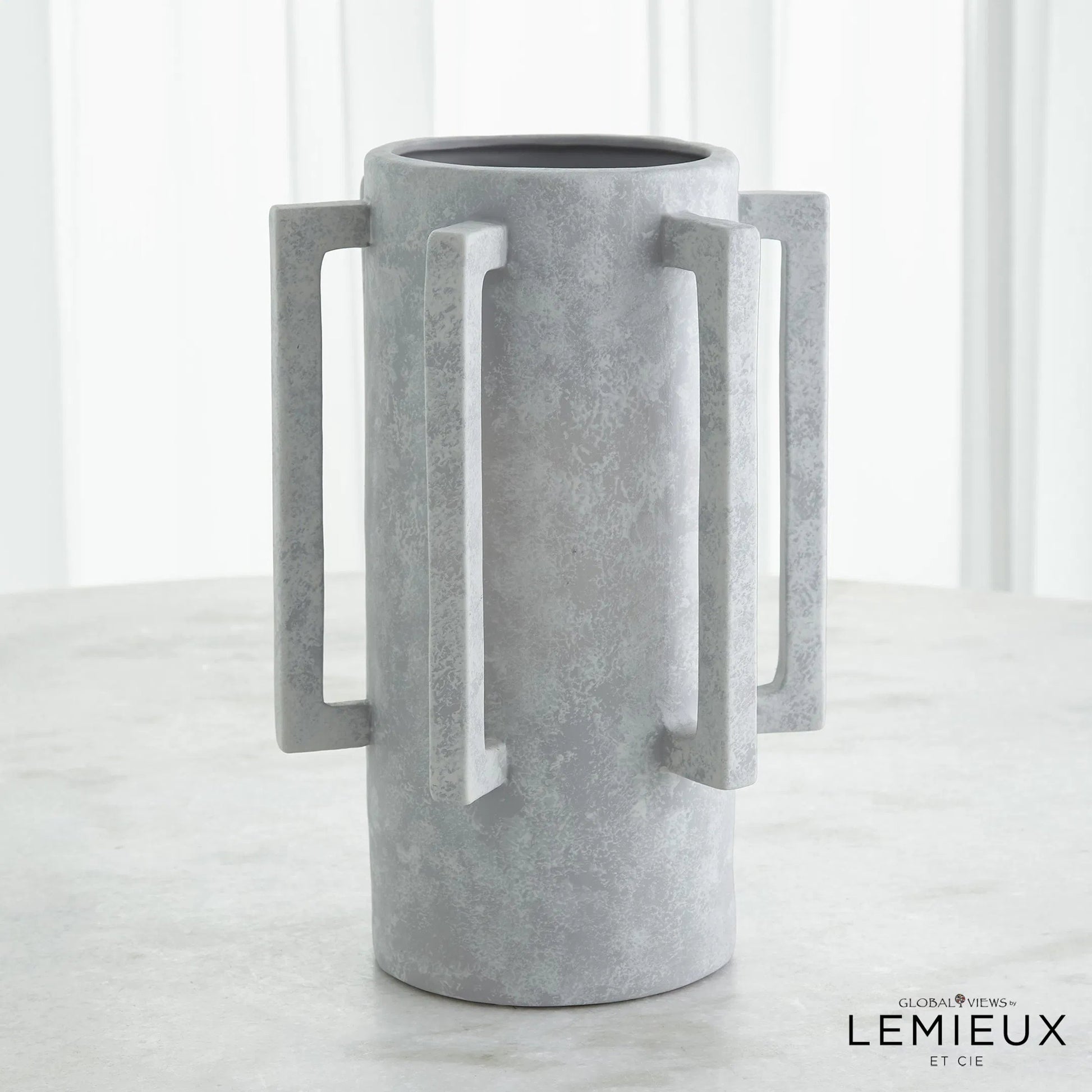 Normandie Vase by Global Views. Made from ceramic in a modern style.