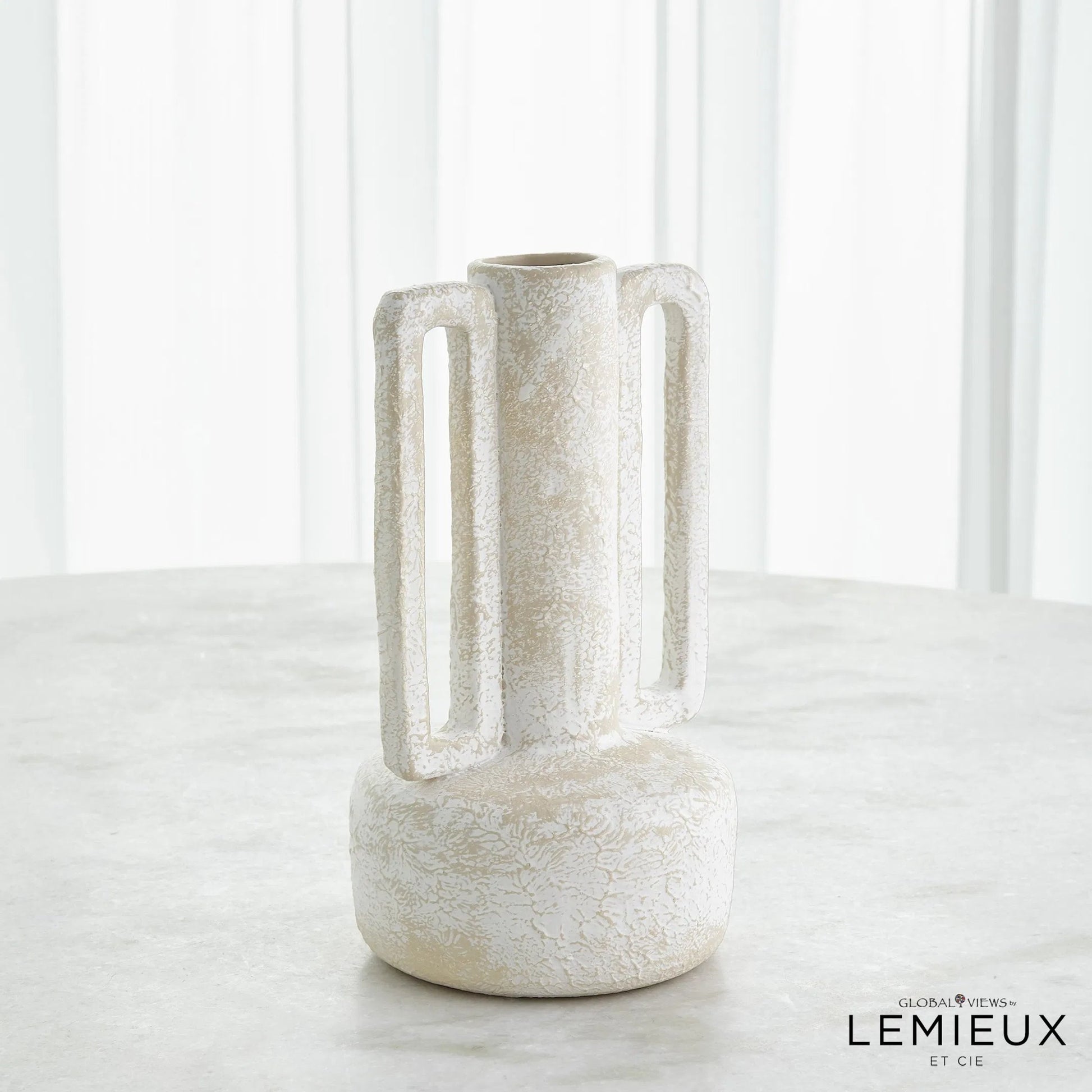 Normandie Vase by Global Views. Made from ceramic in a modern style.