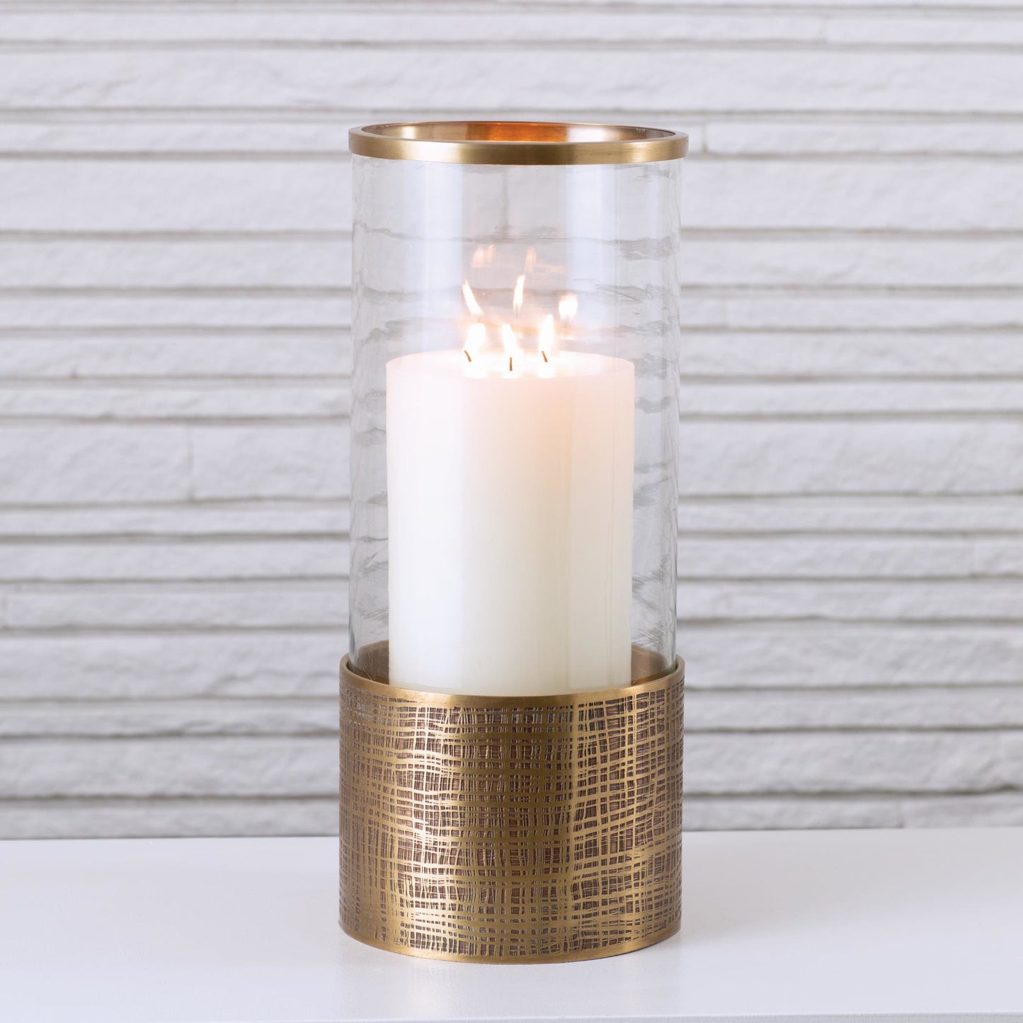 002 SR-701879 | Lifestyle | Plaid Etched Glass Hurricane by Global Views in antique brass. Made from brass, glass in a transitional style.