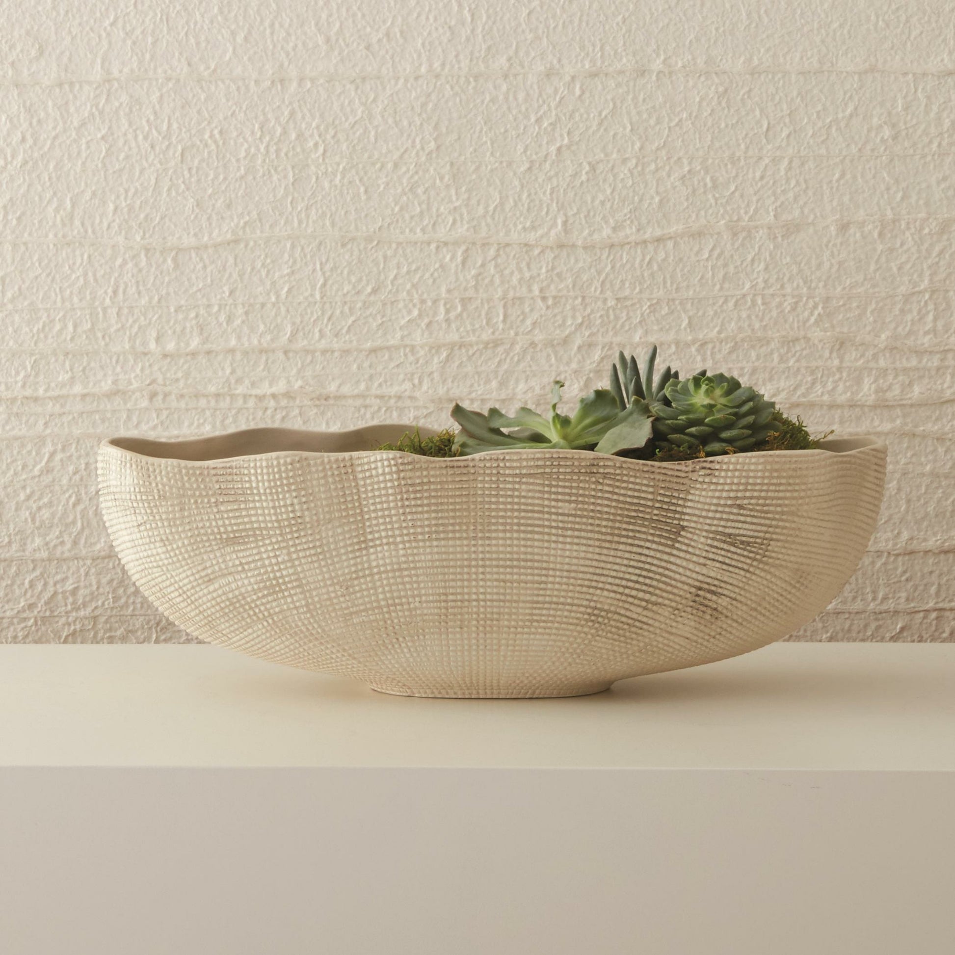 Sisal Oval Bowl by Global Views. Made from ceramic in a coastal style.