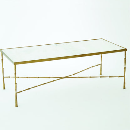 Spike Cocktail Table by Global Views in antique brass. Made from iron, marble in a transitional style.