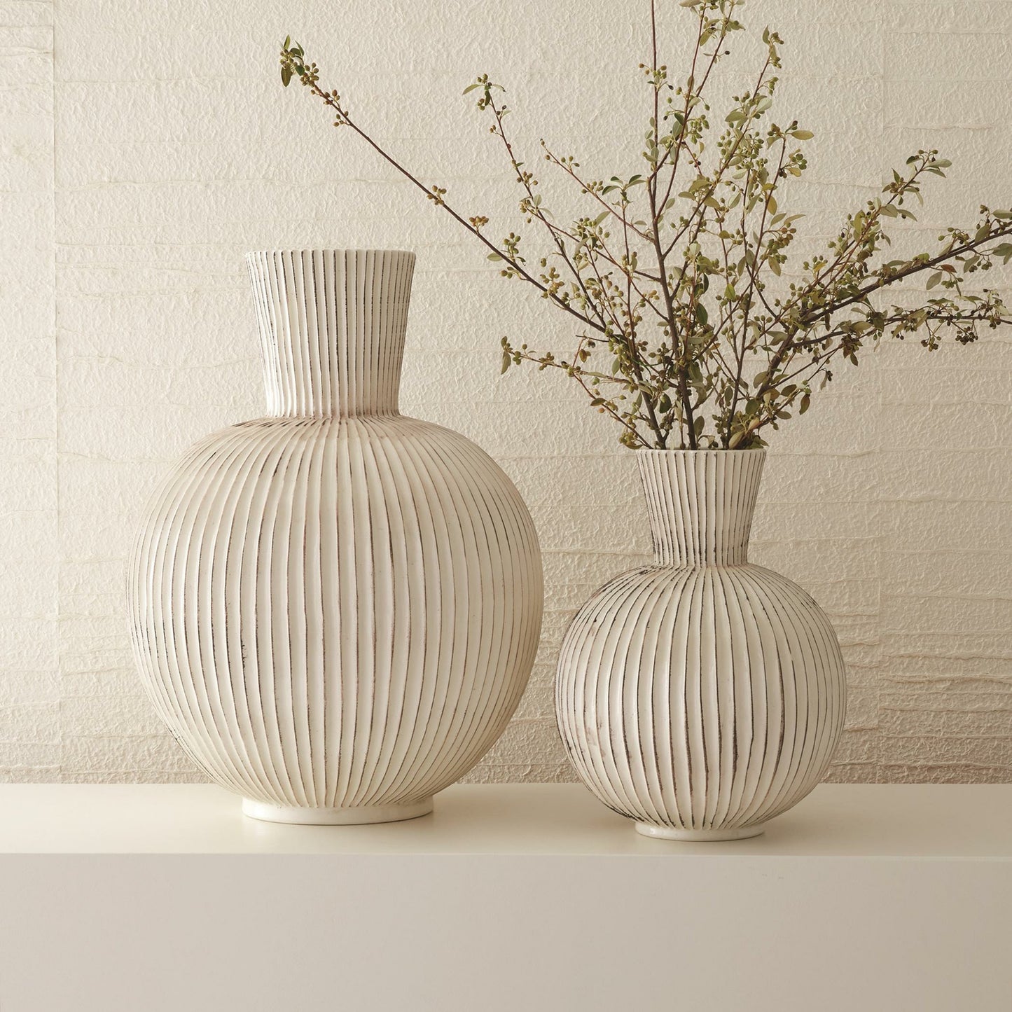 004 SR-827768,SR-827769 | Lifestyle | Furrow Sphere Vase by Global Views. Made from ceramic in a eclectic & global style.