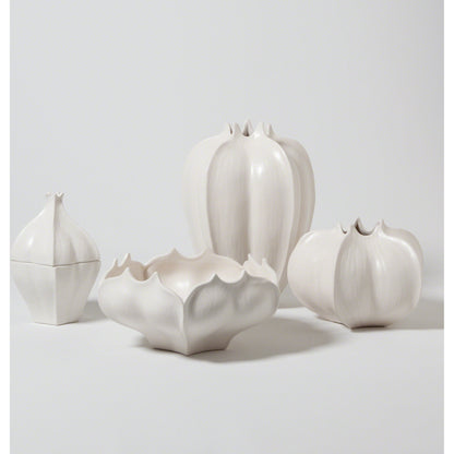 Star Fruit Bowl by Global Views. Made from ceramic in a coastal style.