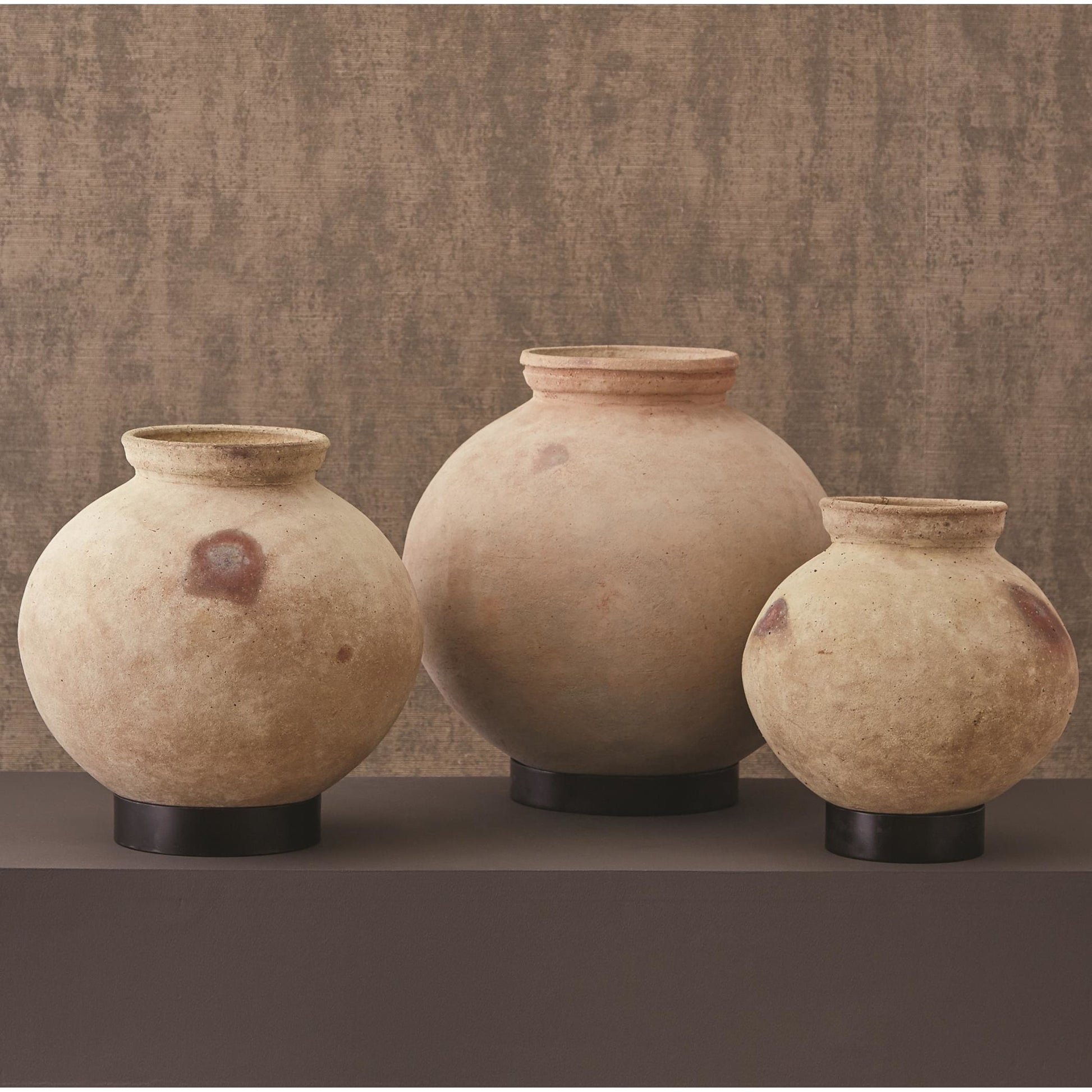 Desert Water Pot with Base by Global Views in burnt wax. Made from iron, terracotta in a rustic style.