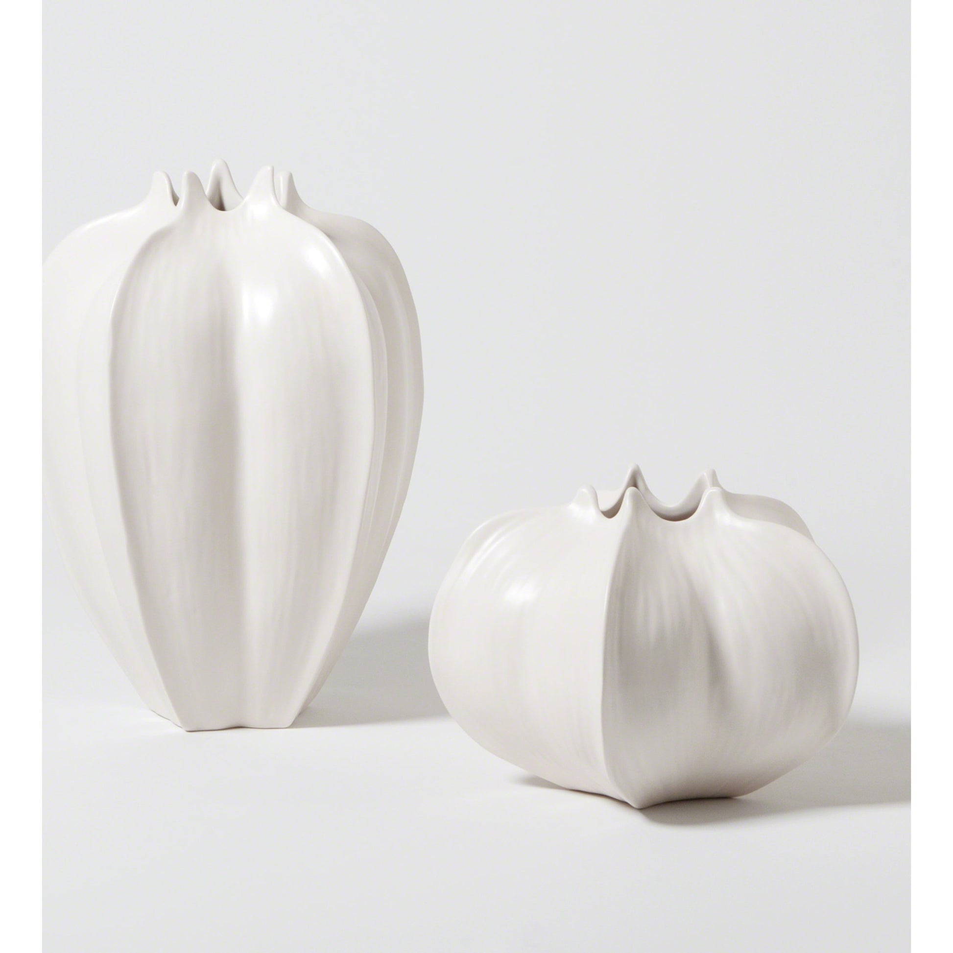 Star Fruit Vase by Global Views. Made from ceramic in a coastal style.
