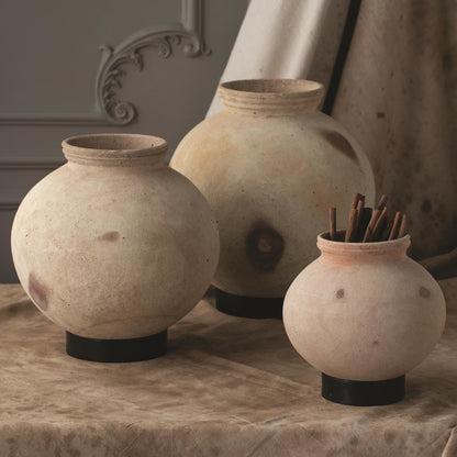 Desert Water Pot with Base by Global Views in burnt wax. Made from iron, terracotta in a rustic style.