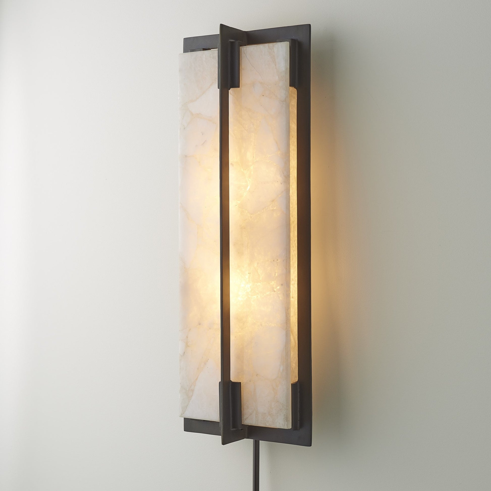Quartz Sconce by Global Views. Made from brass, mild steel, quartz in a modern style.
