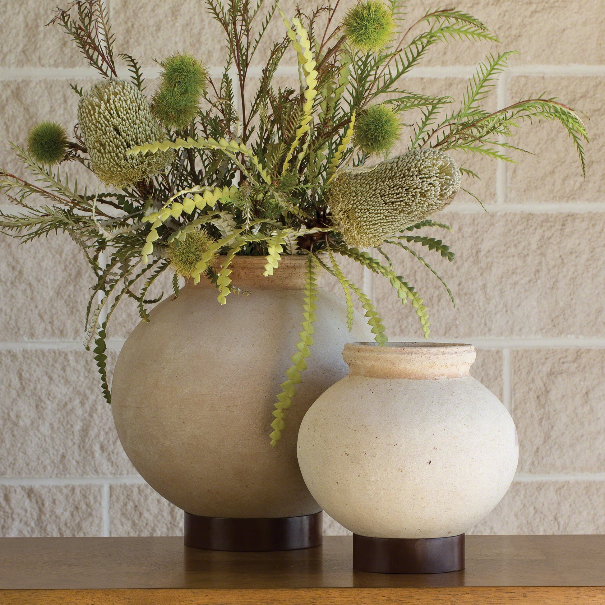 Desert Water Pot with Base by Global Views in burnt wax. Made from iron, terracotta in a rustic style.