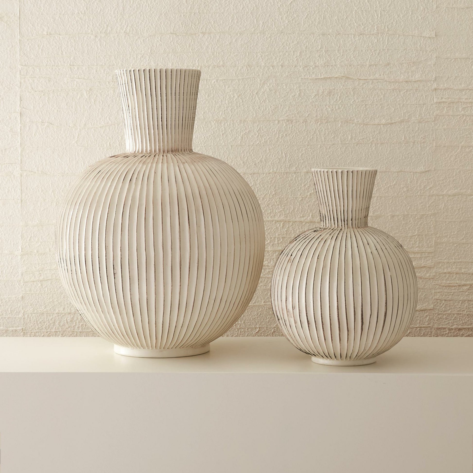 Furrow Sphere Vase by Global Views. Made from ceramic in a eclectic & global style.