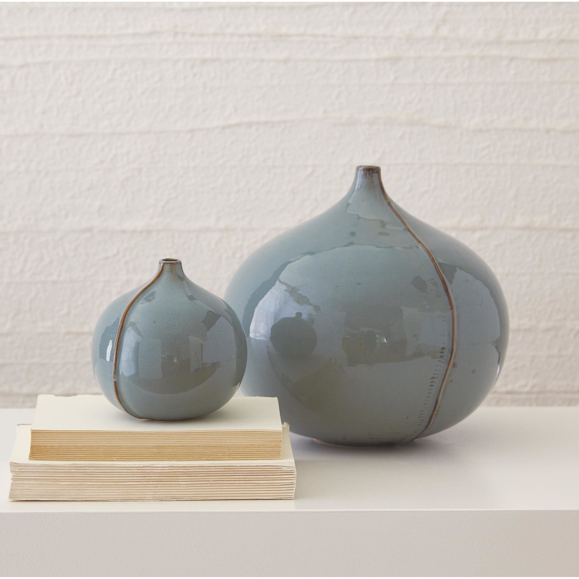 Milo Vase by Global Views in blue. Made from ceramic in a eclectic & global style.