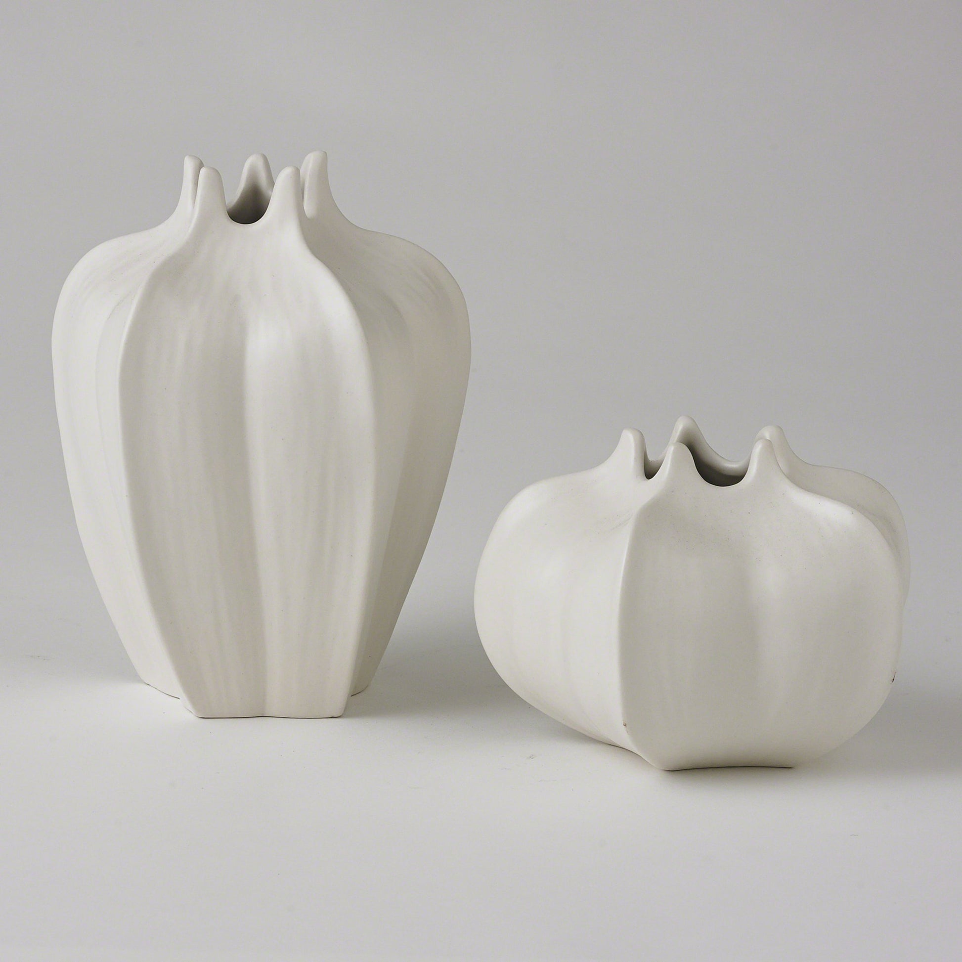 Star Fruit Vase by Global Views. Made from ceramic in a coastal style.