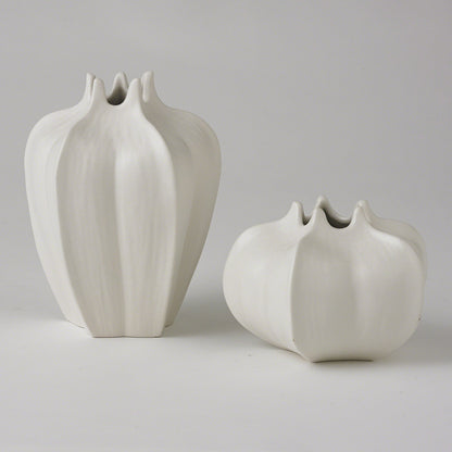 Star Fruit Vase by Global Views. Made from ceramic in a coastal style.