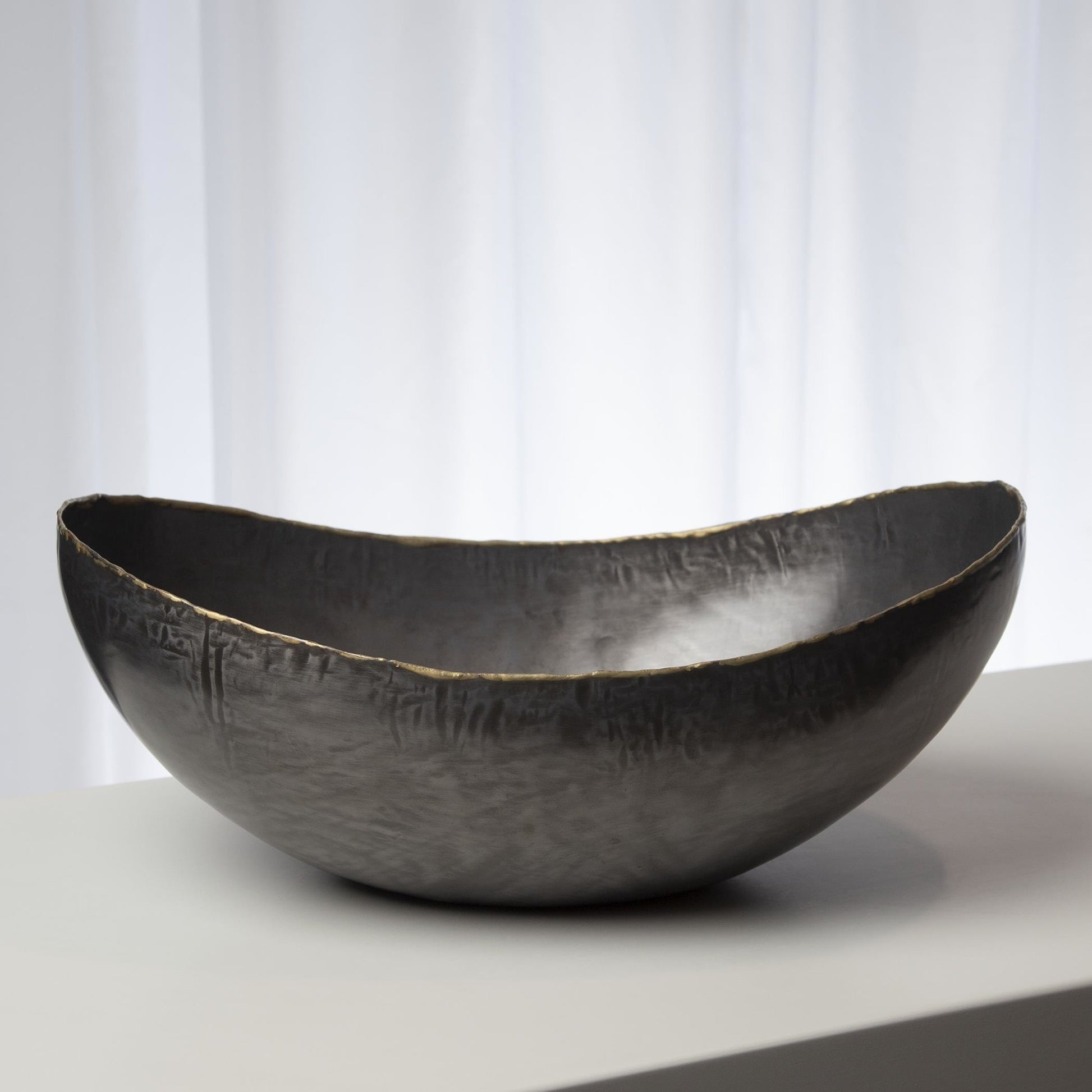 Laforge Oval Bowl by Global Views in natural iron. Made from iron in a eclectic & global style.