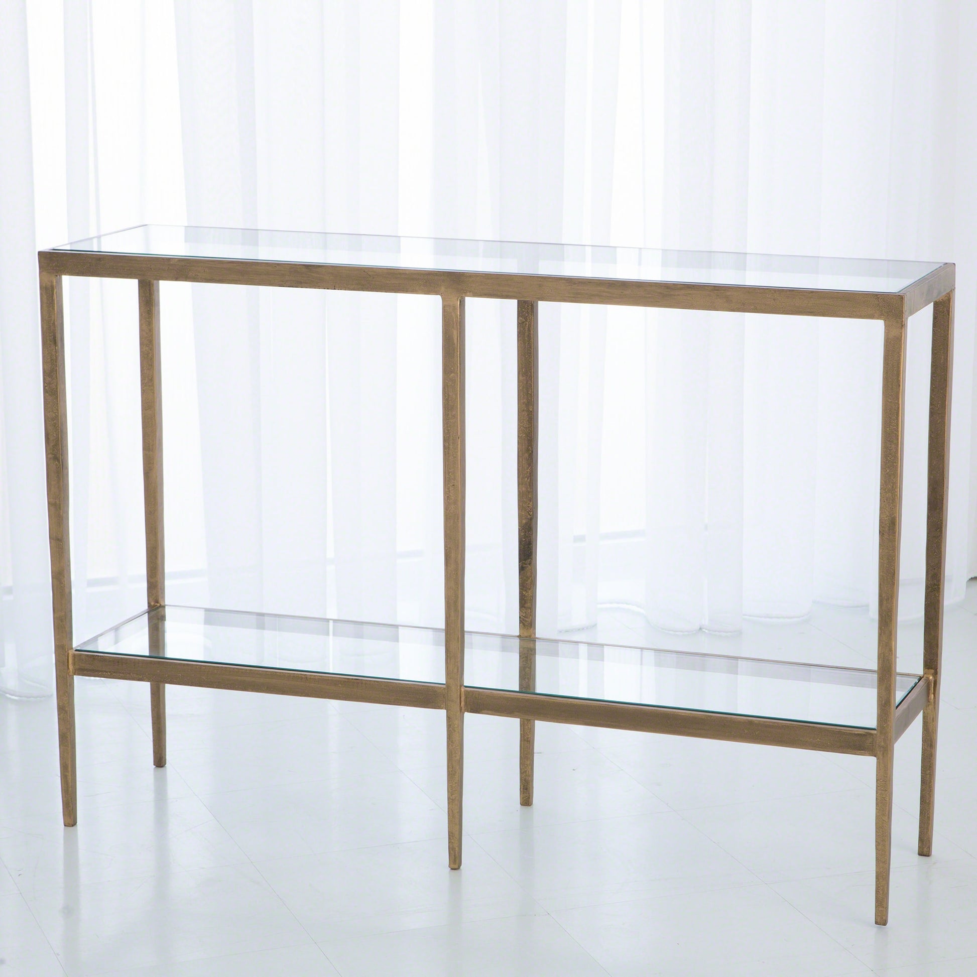 Laforge Console by Global Views. Made from iron, tempered glass in a transitional style.
