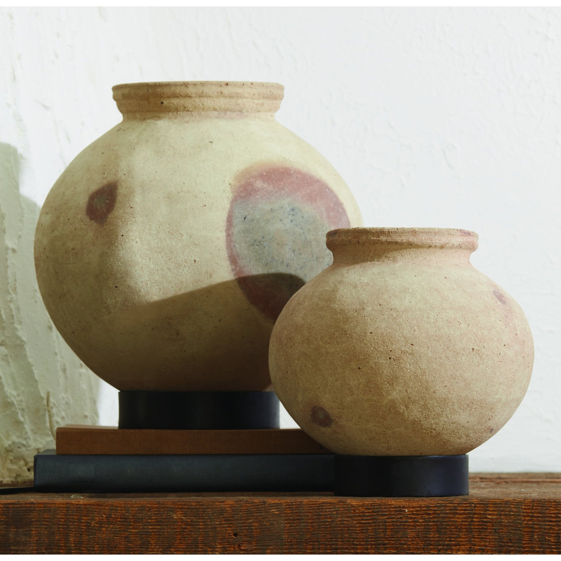 Desert Water Pot with Base by Global Views in burnt wax. Made from iron, terracotta in a rustic style.