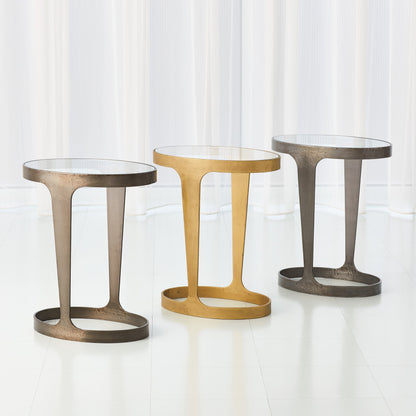 Oslo Accent Table by Global Views in gold. Made from iron, tempered glass in a eclectic & global style.