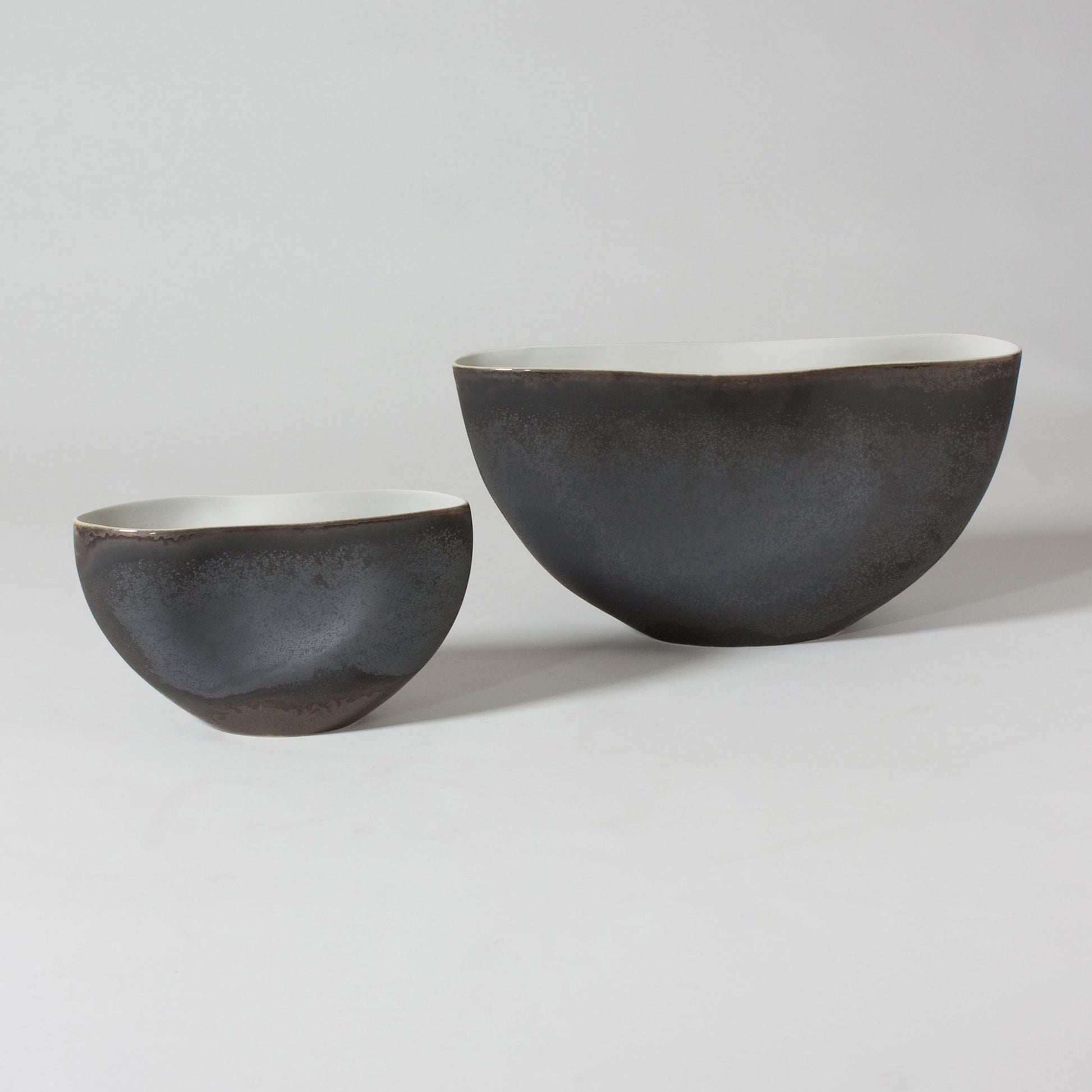 Oxus Pinched Bowl by Global Views. Made from porcelain in a eclectic & global style.