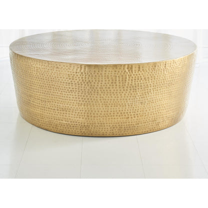 Izmir Hammered Cocktail Table by Global Views. Made from brass in a eclectic & global style.