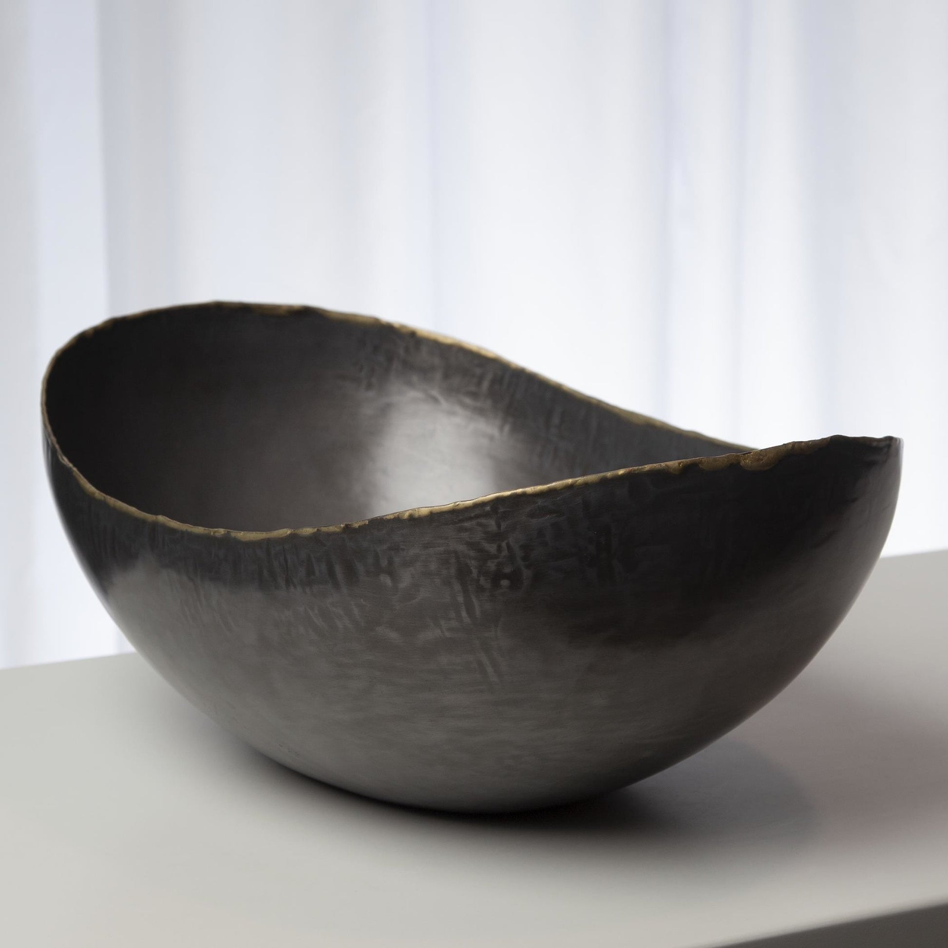 Laforge Oval Bowl by Global Views in natural iron. Made from iron in a eclectic & global style.