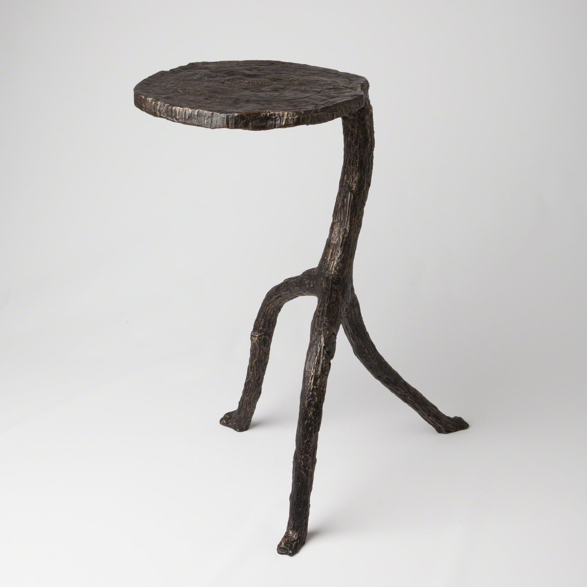 Wal Sticks Table by Global Views in antique bronze. Made from cast iron in a eclectic & global style.