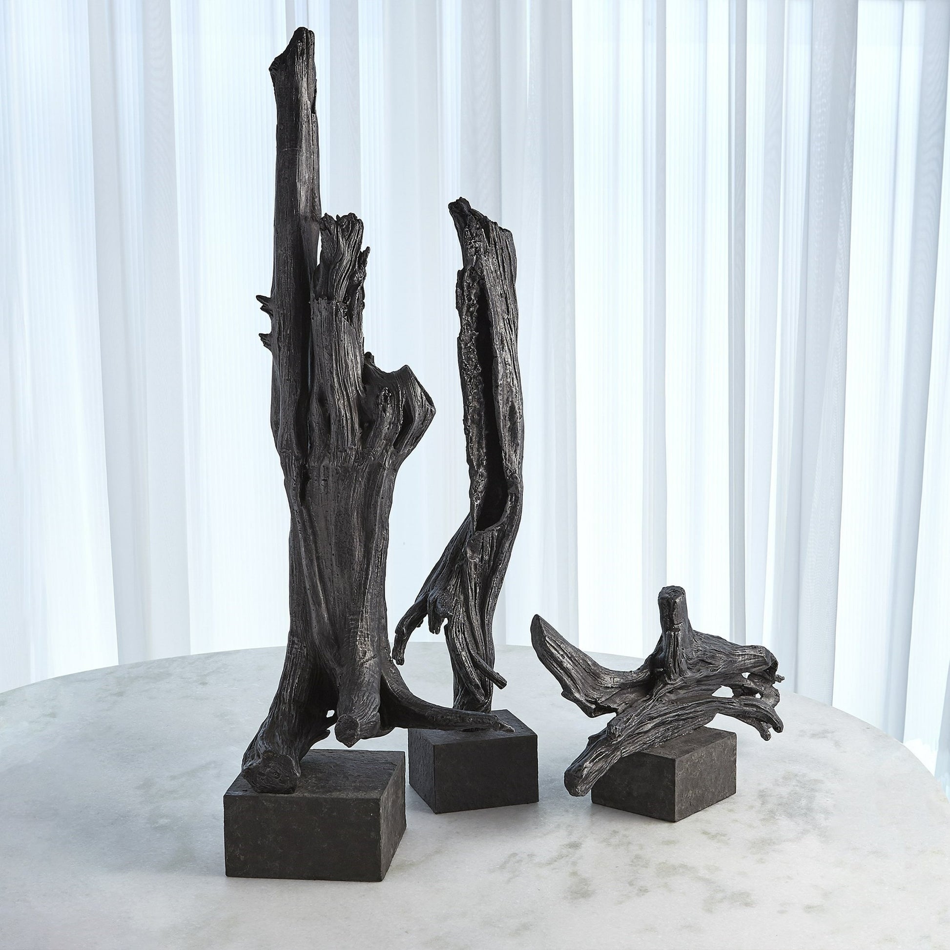 Iron Driftwood Sculpture by Global Views. Made from cast iron, marble in a eclectic & global style.
