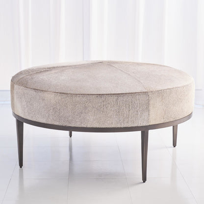 Urban Ottoman with Hair-On-Hide by Global Views. Made from mango, plyboard, iron in a transitional style.