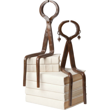 Iron Sitting Couple by Global Views. Made from iron in a modern style.