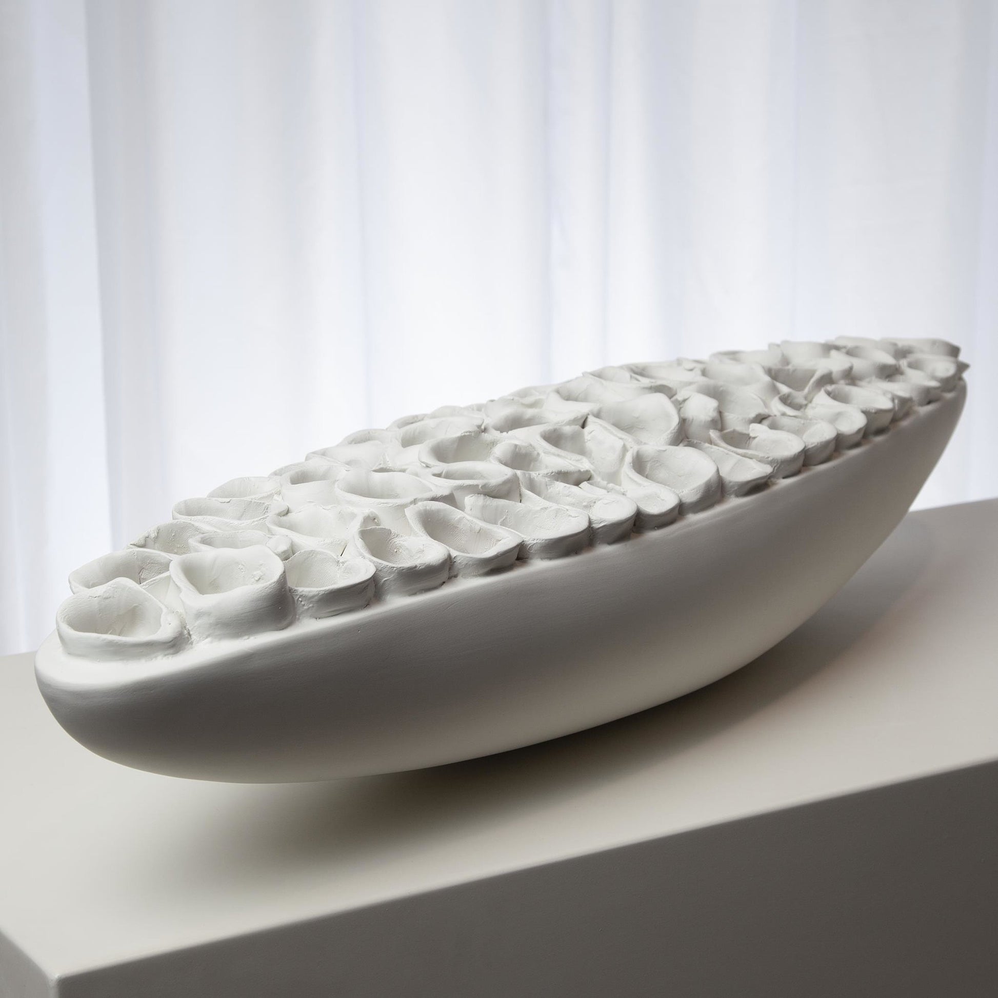 Reef Centerpiece by Global Views. Made from artistic ceramic in a coastal style.