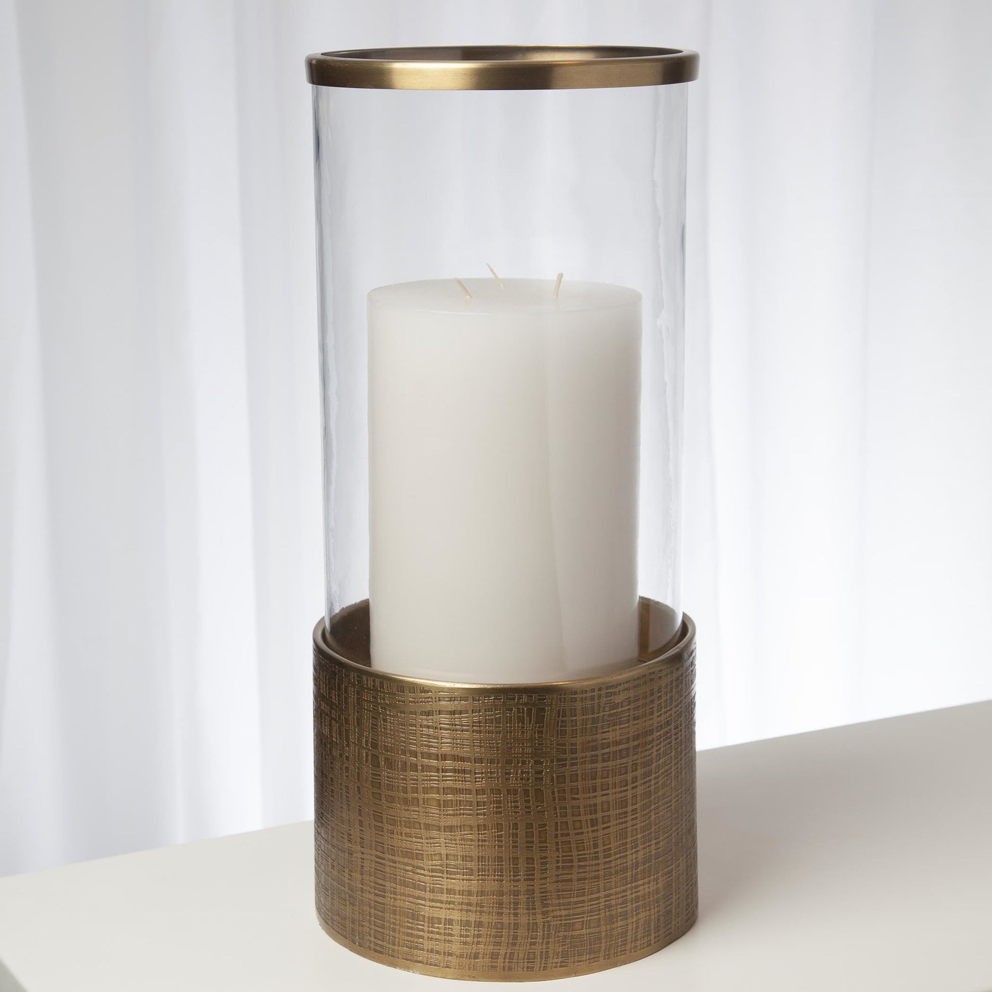 Plaid Etched Glass Hurricane by Global Views in antique brass. Made from brass, glass in a transitional style.