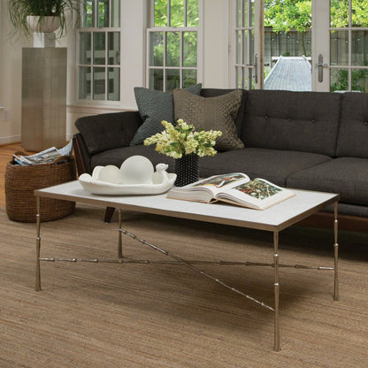 Spike Cocktail Table by Global Views in antique brass. Made from iron, marble in a transitional style.