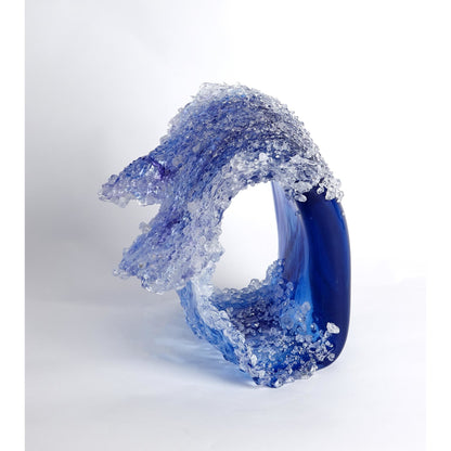 Tidal Wave Sculpture by Global Views. Made from art glass in a coastal style.