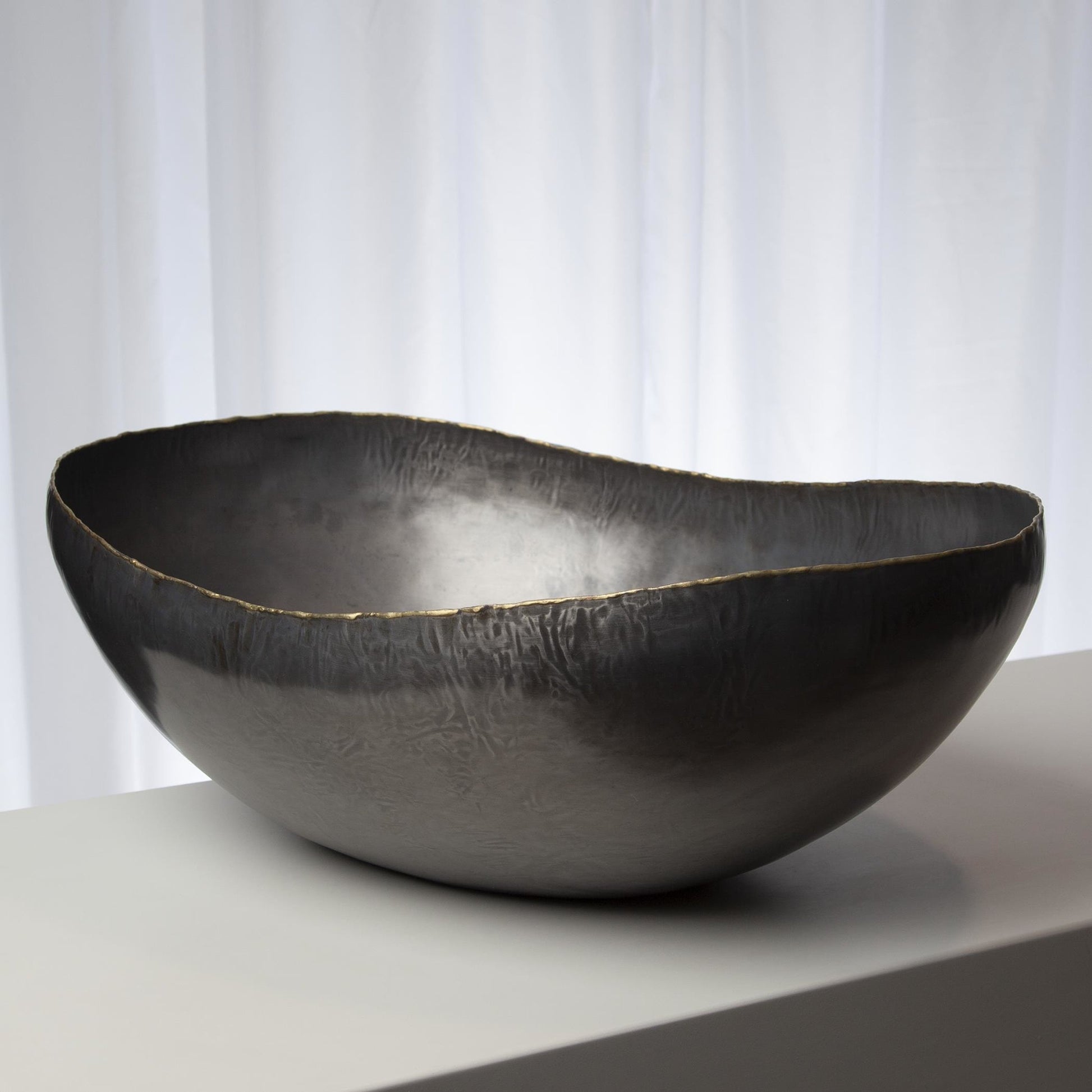 Laforge Oval Bowl by Global Views in natural iron. Made from iron in a eclectic & global style.