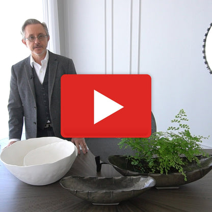 Spiral Bowl by Global Views in matte white. Made from ceramic in a coastal style.