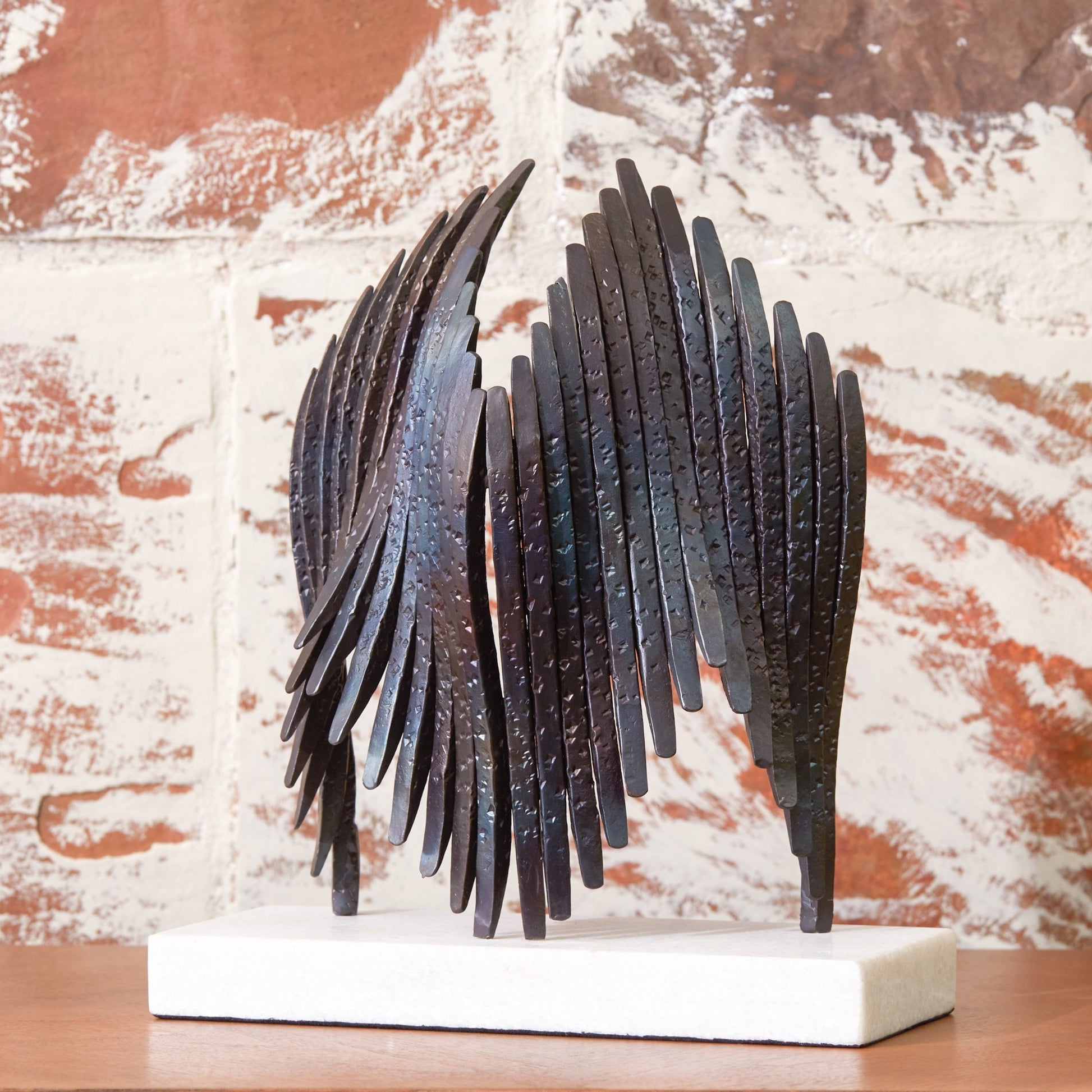 Icarus Sculpture by Global Views. Made from iron, white marble in a eclectic & global style.