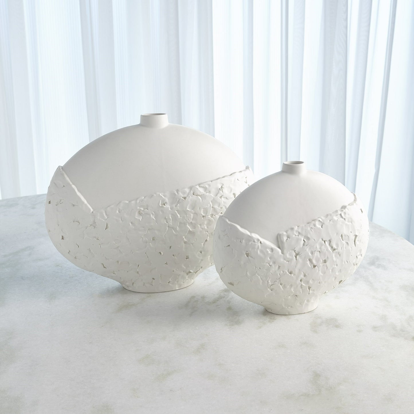001 SR-890495 | Primary Silo | Asymmetrical Stipple Vase by Global Views in matte white. Made from ceramic in a coastal style.