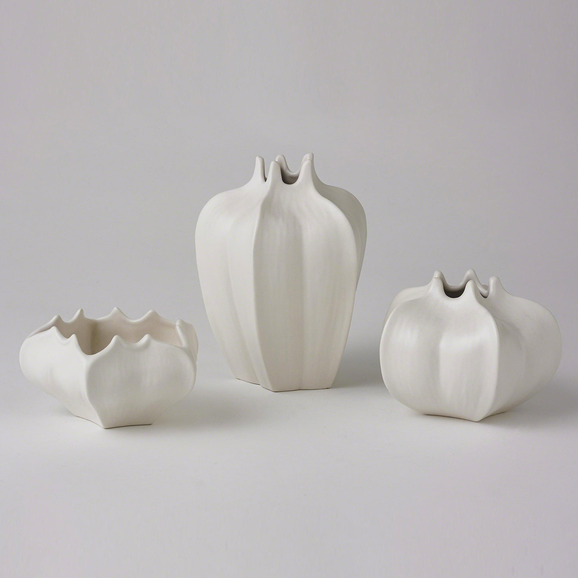 Star Fruit Vase by Global Views. Made from ceramic in a coastal style.
