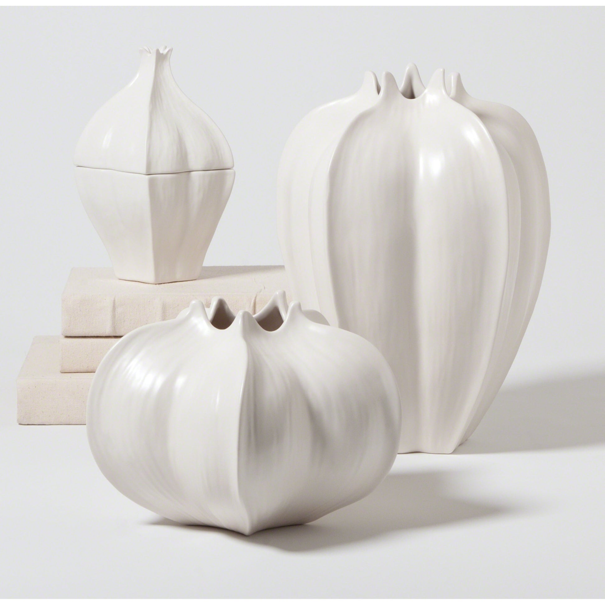 Star Fruit Vase by Global Views. Made from ceramic in a coastal style.