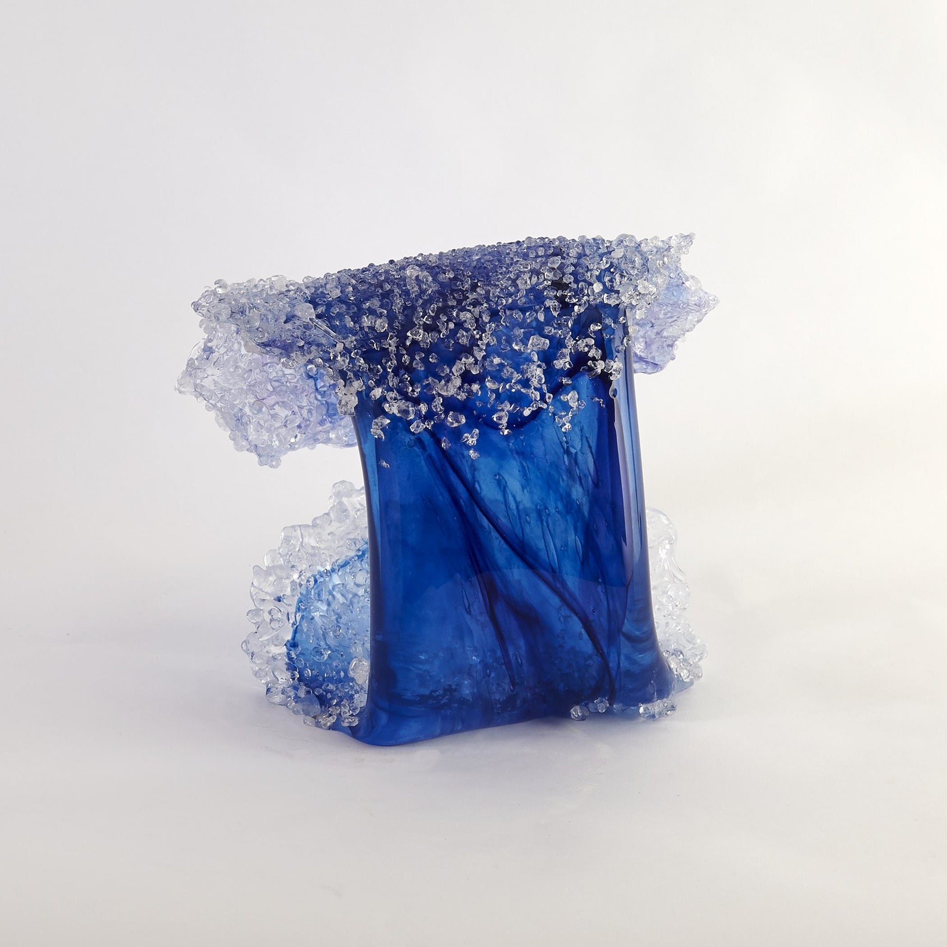 Tidal Wave Sculpture by Global Views. Made from art glass in a coastal style.