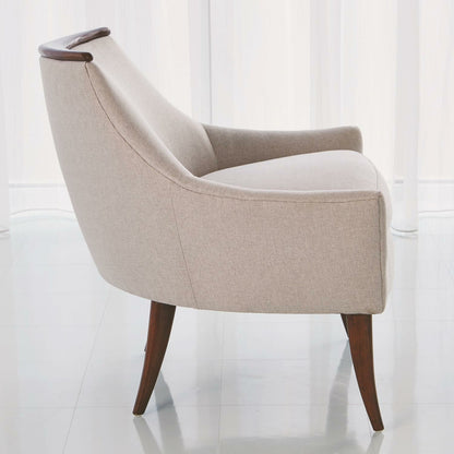 Boomerang Chair by Global Views in white leather. Made from rubberwood, ebony in a transitional style.