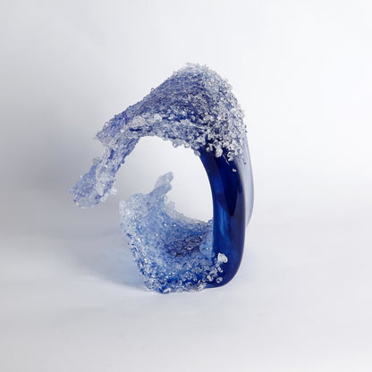 Tidal Wave Sculpture by Global Views. Made from art glass in a coastal style.