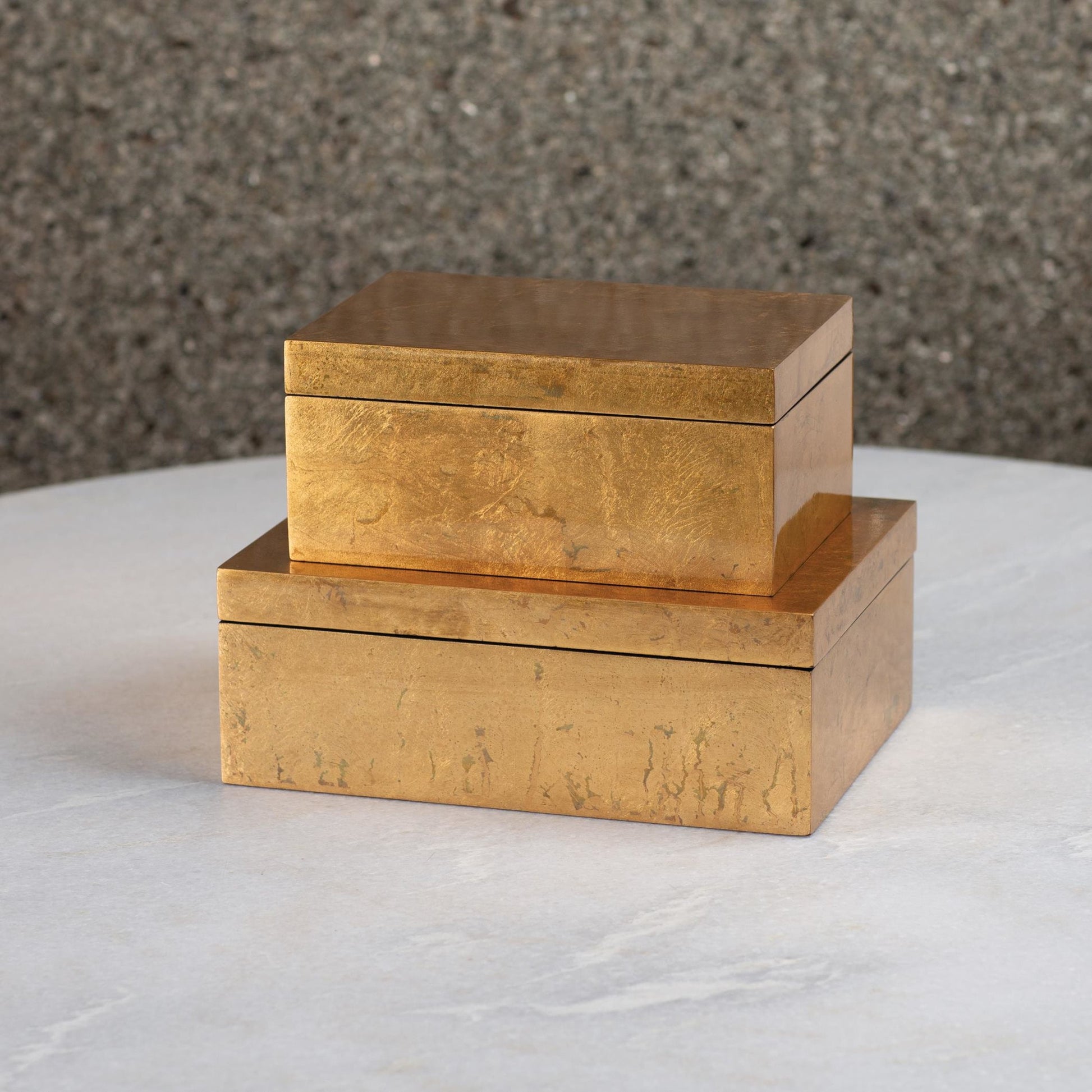 Luxe Leaf Box by Global Views in vietnamese lacquer, gold leaf. Made from mdf in a transitional style.