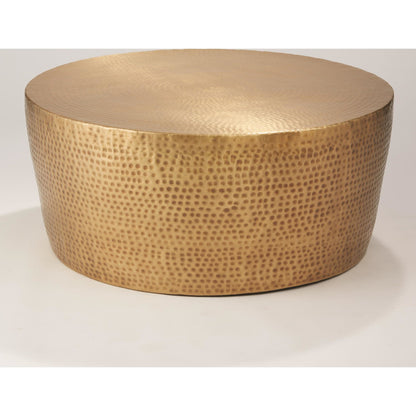 Izmir Hammered Cocktail Table by Global Views. Made from brass in a eclectic & global style.