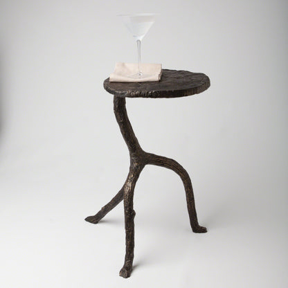 Wal Sticks Table by Global Views in antique bronze. Made from cast iron in a eclectic & global style.