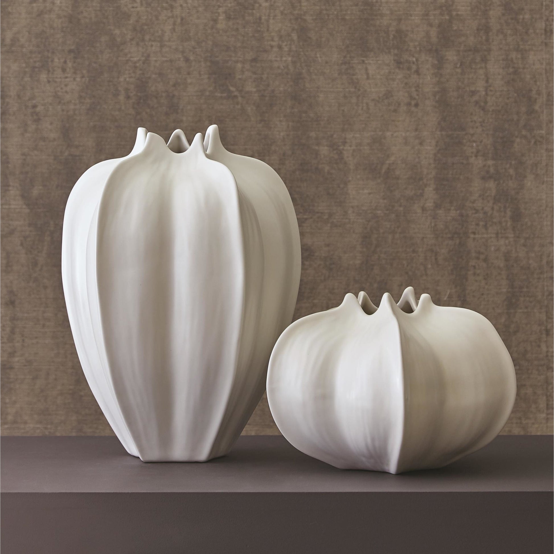 Star Fruit Vase by Global Views. Made from ceramic in a coastal style.