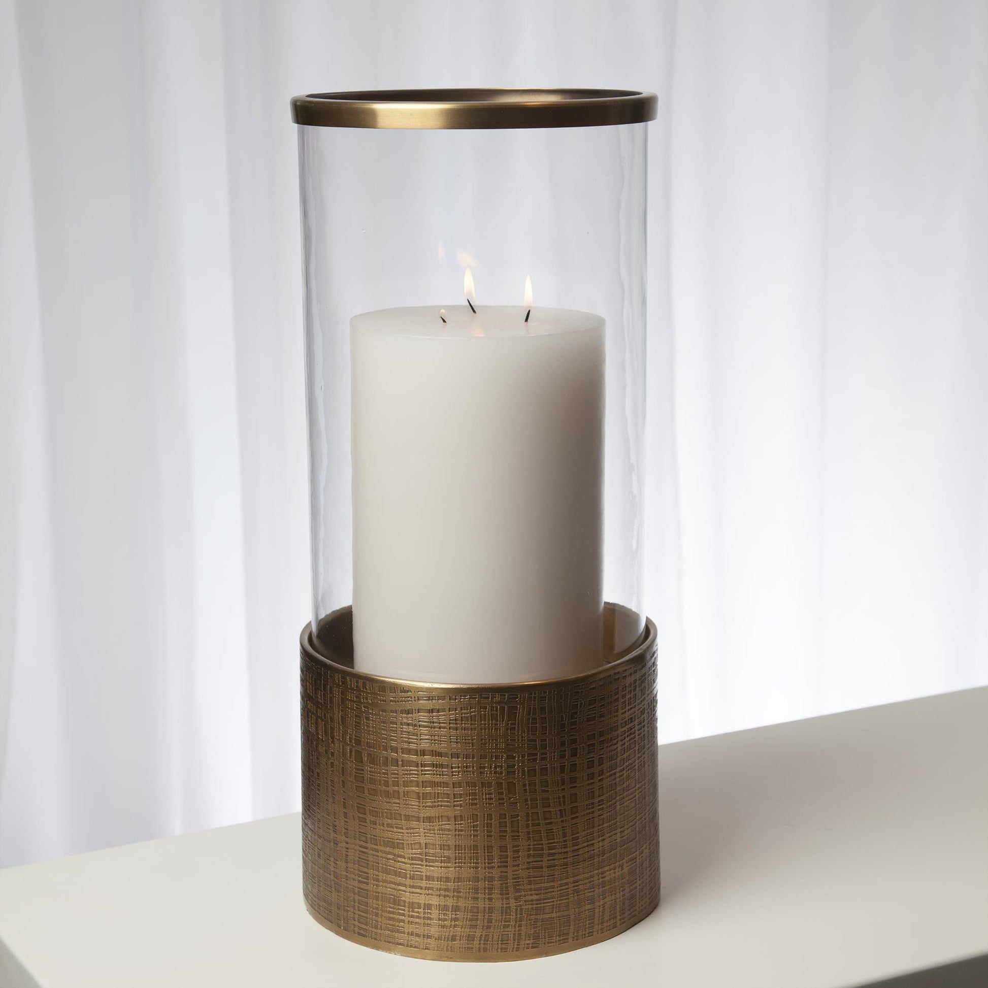 Plaid Etched Glass Hurricane by Global Views in antique brass. Made from brass, glass in a transitional style.