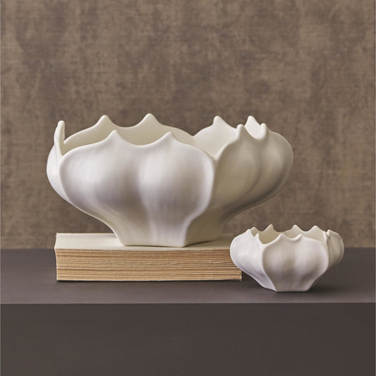 Star Fruit Bowl by Global Views. Made from ceramic in a coastal style.