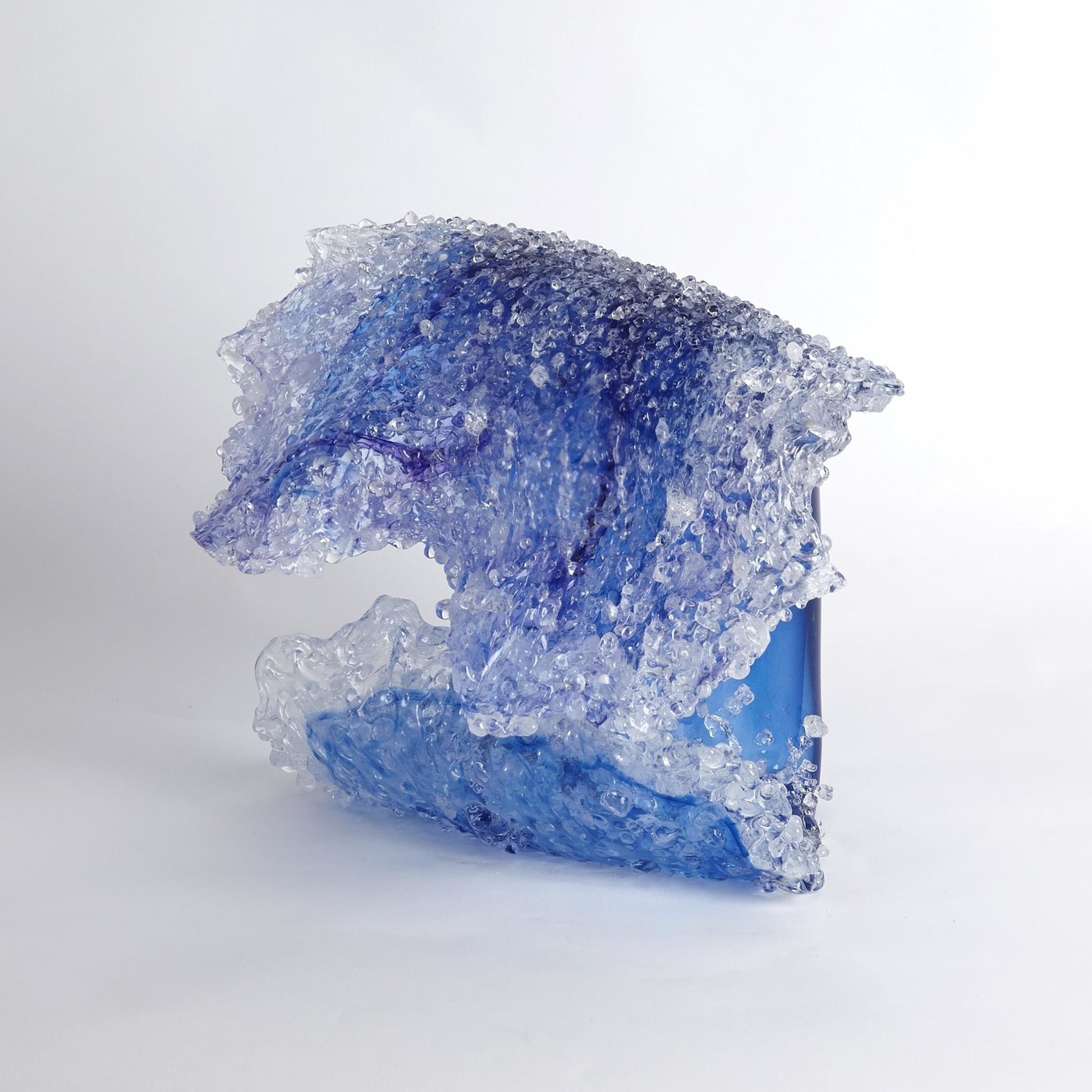 Tidal Wave Sculpture by Global Views. Made from art glass in a coastal style.