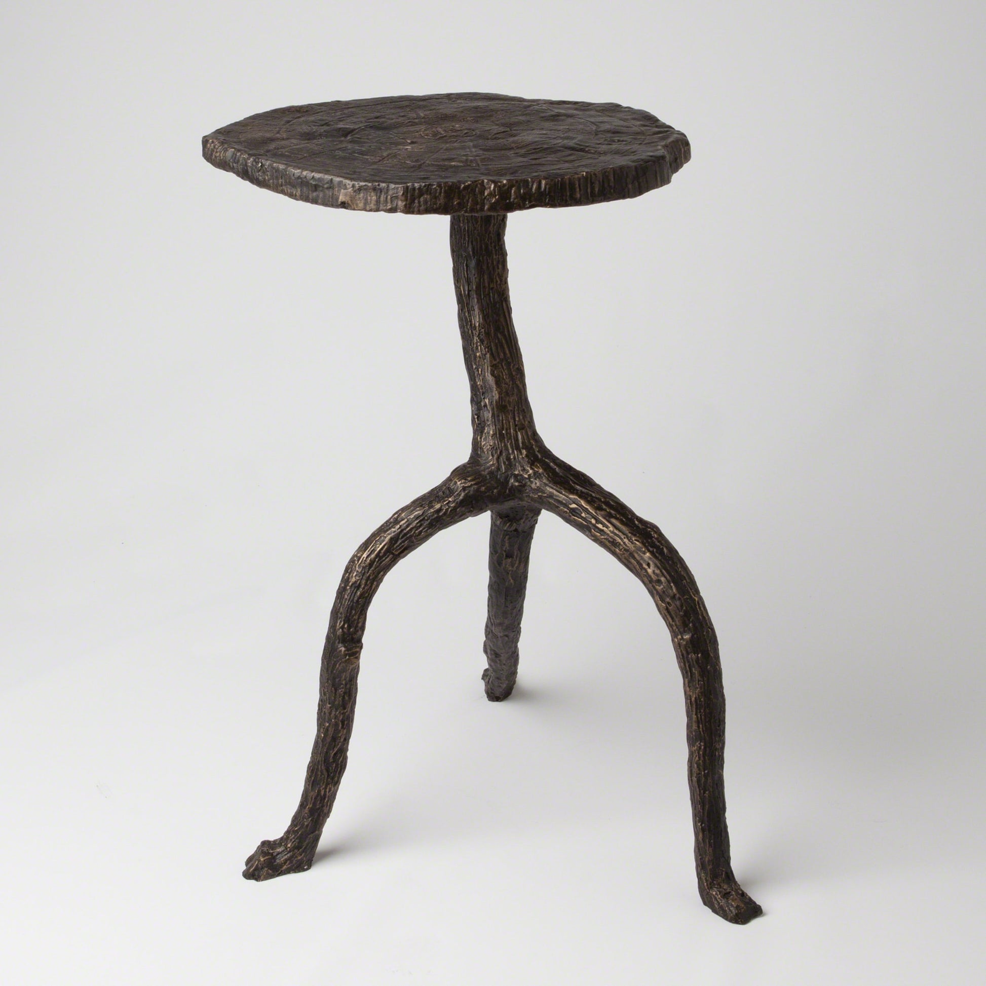 Wal Sticks Table by Global Views in antique bronze. Made from cast iron in a eclectic & global style.